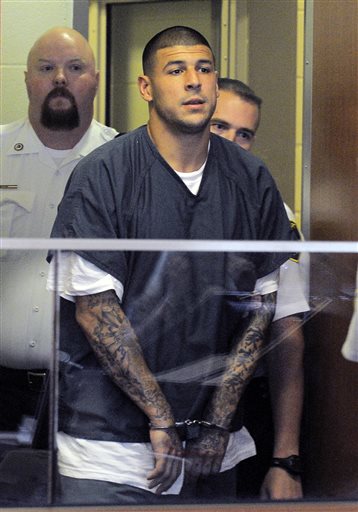 Former New England Patriots football player Aaron Hernandez enters a courtroom for a bail hearing in Fall River Superior Court on Thursday. Hernandez, charged with murdering Odin Lloyd, a 27-year-old semi-pro football player, was denied bail.