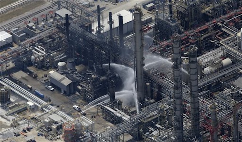 A chemical plant fire is seen in this aerial photo about twenty miles southeast of Baton Rouge, in Geismer, La., Thursday, June 13, 2013. Ambulances and helicopters took at least 30 people from the burning chemical plant after an explosion Thursday, officials said. Early tests did not indicate dangerous levels of any chemicals around the plant, but area residents were told to remain indoors with doors and windows closed, said Jean Kelly, spokeswoman for the state Department of Environmental Quality. (AP Photo/Gerald Herbert)