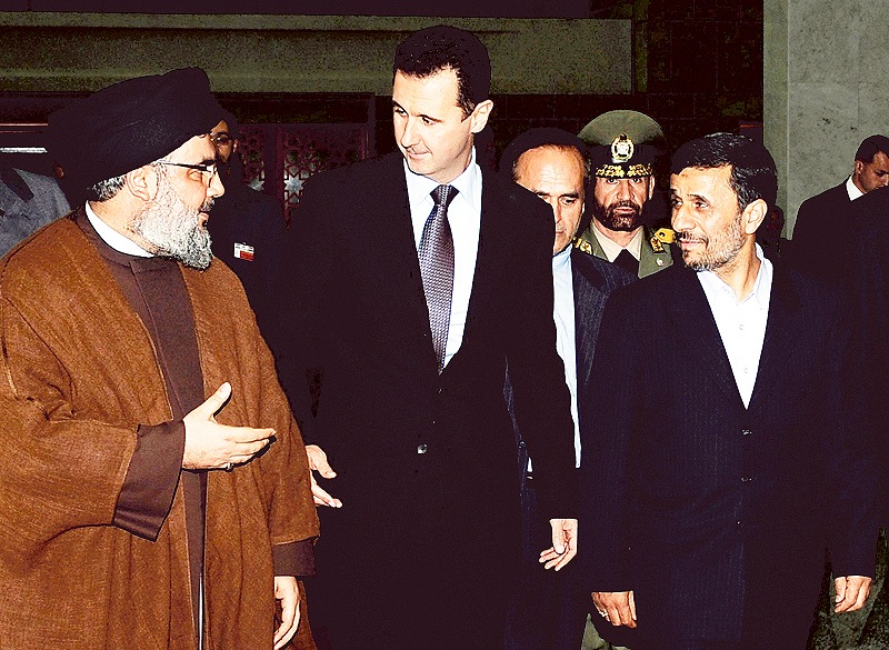 Hezbollah leader Sheik Hassan Nasrallah, left, speaks with Syrian President Bashar Assad, center, and then-Iranian President Mahmoud Ahmadinejad in Damascus, Syria. Many are saying America should intervene in Syria, but former Sen. Barney Frank disagrees. “I have not heard or read ... a coherent explanation of what it is they believe America can do to make it better (in Syria),” he writes.