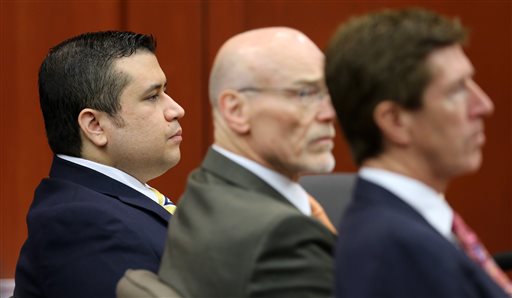 George Zimmerman, left, sits with his defense lawyers, Don West, center, and Mark O'Mara, during the 15th day of his trial in Seminole Circuit Court in Sanford, Fla., Friday.