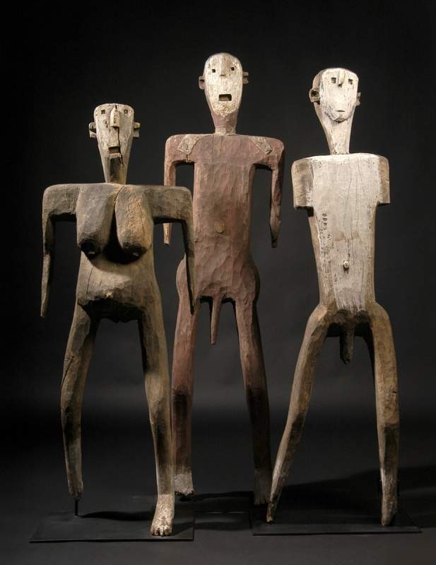 From Sukuma, Tanzania, “Dance figures,” no date, wood, metal, pigments.