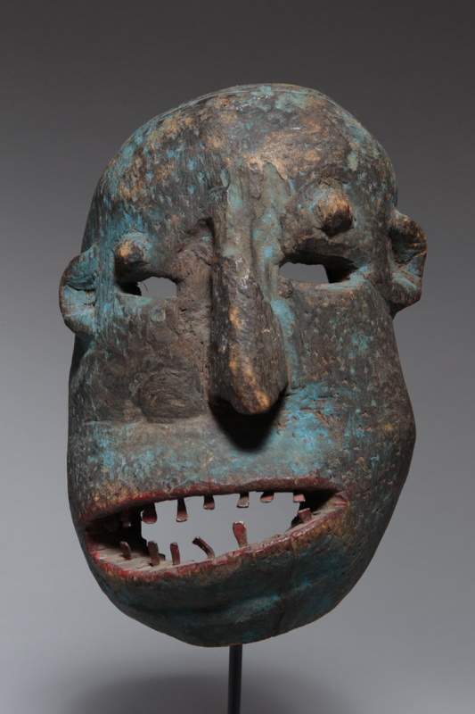 From Sukuma, Tanzania, “Lyako Mask,” no date, wood, metal, pigment.