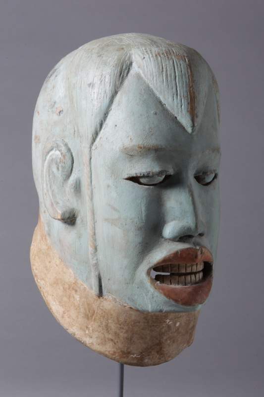 From Makonde, Tanzania, “Mask, foreigner,” no date, wood and pigment.