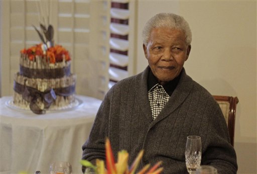 Former South African President Nelson Mandela celebrates his 94th birthday with family in Qunu, South Africa, last year. He was said to be in critical condition Sunday.