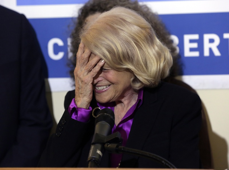 Edith Windsor, the plaintiff in the historic gay marriage case that was before the U.S. Supreme Court, reacts during a news conference at the LGBT Center, in New York, Wednesday, June 26, 2013. In a major victory for gay rights, the U.S. Supreme Court on Wednesday struck down a provision of a federal law denying federal benefits to married gay couples and cleared the way for the resumption of same-sex marriage in California. (AP Photo/Richard Drew)