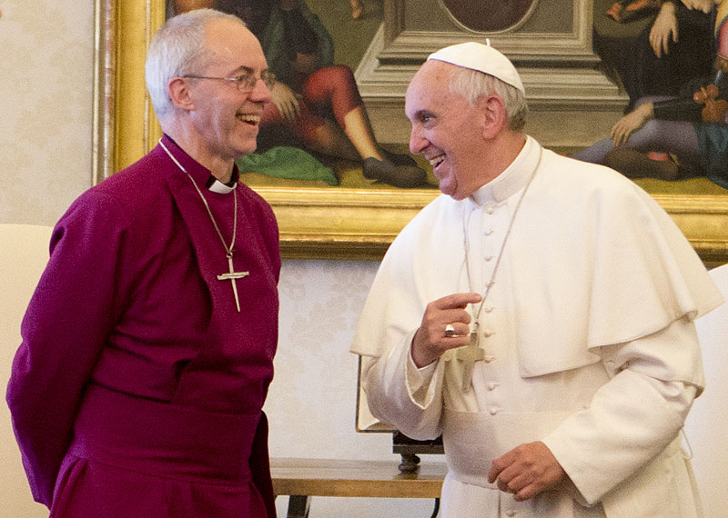 Archbishop of Canterbury Justin Welby, left, meets Pope Francis during a congenial private meeting at the Vatican Friday.