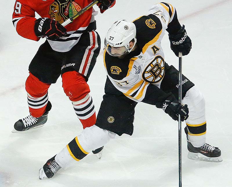 Patrice Bergeron of the Boston Bruins was injured in the second period Saturday night and spent the night in a Chicago hospital. He flew home with the Bruins on Sunday and his status for Monday night's Game 6 is unknown.