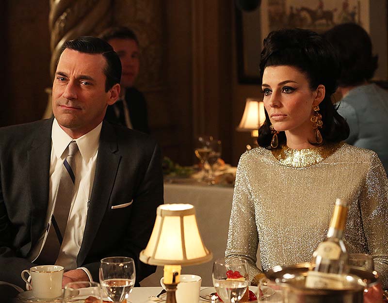 This TV publicity image released by AMC shows Jon Hamm as Don Draper, left, and Jessica Pare as Megan Draper in a scene from "Mad Men." The season finale airs Sunday night. Linda Cardellini;Jon Hamm;Group