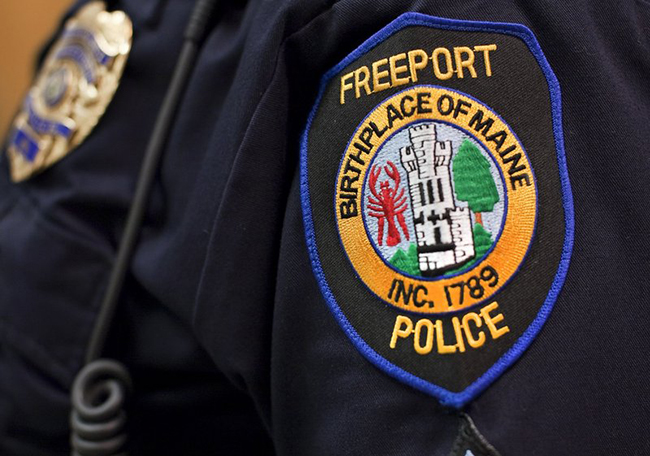 The Freeport Police Department shoulder patch displaying the debunked motto will be phased out, according to Town Manager Peter Joseph.