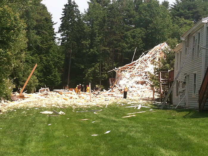 An apparent propane blast that could be felt for miles killed one man, damaged homes and showers debris on a stunned neighborhood in Yarmouth on Tuesday.