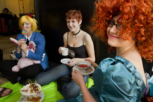 Coryn Armstrong of Cumberland, Sam Dow of Portland and Yuki Hall of Portland have a tea party during the final day of the PortConMaine festival at the Doubletree Hotel in South Portland on Sunday.