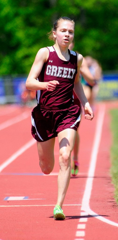 Kirstin Sandreuter of Greely has the finish line in sight as she finishes second to Bethanie Brown of Waterville in the 1,600.