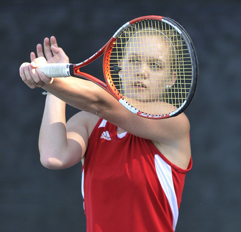 Mikaela Gove of Scarborough hits a return Wednesday during her loss to Portland’s Sophie Hulbert at No. 2 singles in the Western Class A final. Portland won, 4-1.
