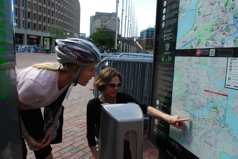 Eileen Morrison of Boston learns the nearest Boston Bike Share hub to her home from Nicole Freedman, Boston Bike’s director, during rush hour.