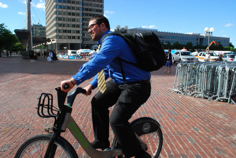 Alex Moran of Boston’s Allston area is among the many Bostonians to take advantage of Boston’s two-year-old Bike Share that offers low-cost bicycle rentals 24/7 from outdoor docks all around the city. Portland has obtained federal money to explore the feasibility of such a program.