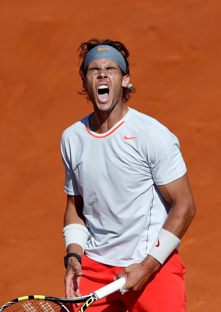 Rafael Nadal roars with authority during Thursday's marathon match against Novak Djokovic at the French Open.