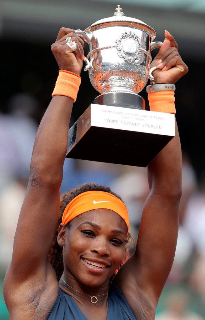Serena Williams celebrates her victory in the French Open on Saturday, telling an appreciative crowd she considers herself a Parisian.