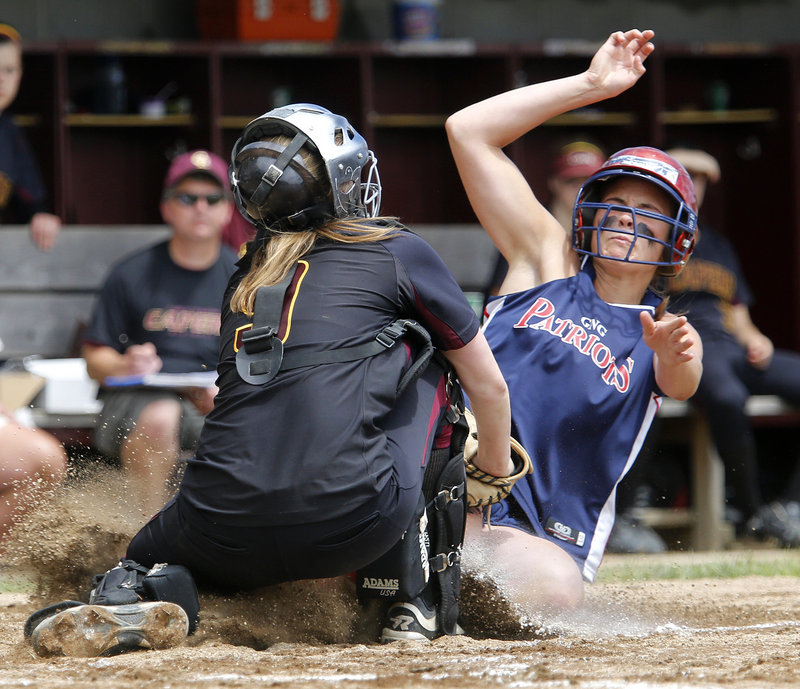 Cape Elizabeth catcher Elise Fathers holds her ground and tags out Maria Valente of Gray-New Gloucester. Gray-NG will play Greely for the Western Class B title.