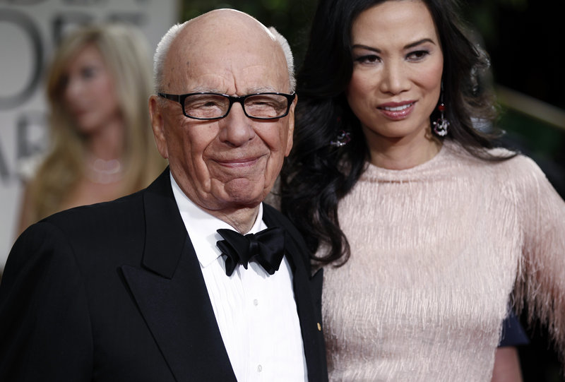 Rupert Murdoch and his wife, Wendi, arrive at the 69th Annual Golden Globe Awards in Los Angeles in 2012.