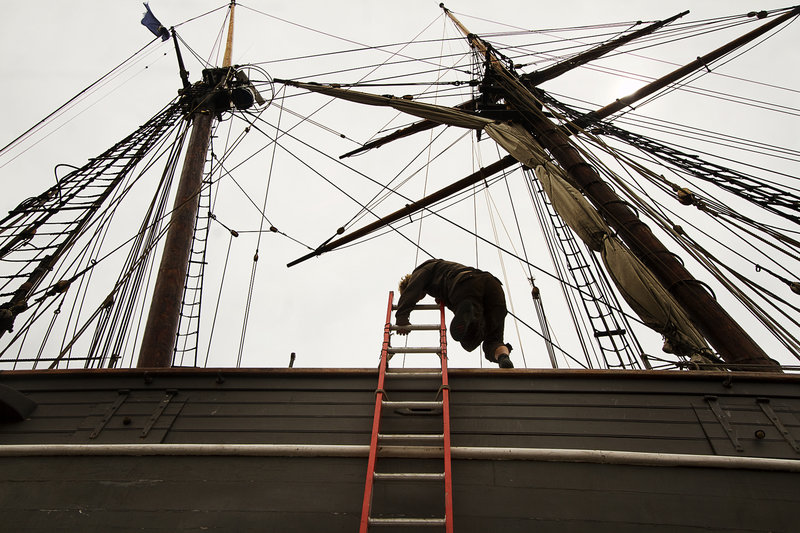 A crew member works on the former slave ship Amistad in dry dock at Gowen Marine in Portland on Thursday June 13, 2013.