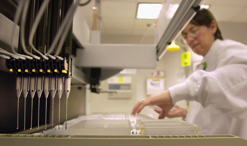 A technician loads patient samples into a machine for testing at Myriad Genetics in Salt Lake City on Friday. The company sought to patent BRCA genes, which are significant in evaluating a woman’s risk for breast and ovarian cancer. The Supreme Court ruled Thursday that laws of nature are not patentable.