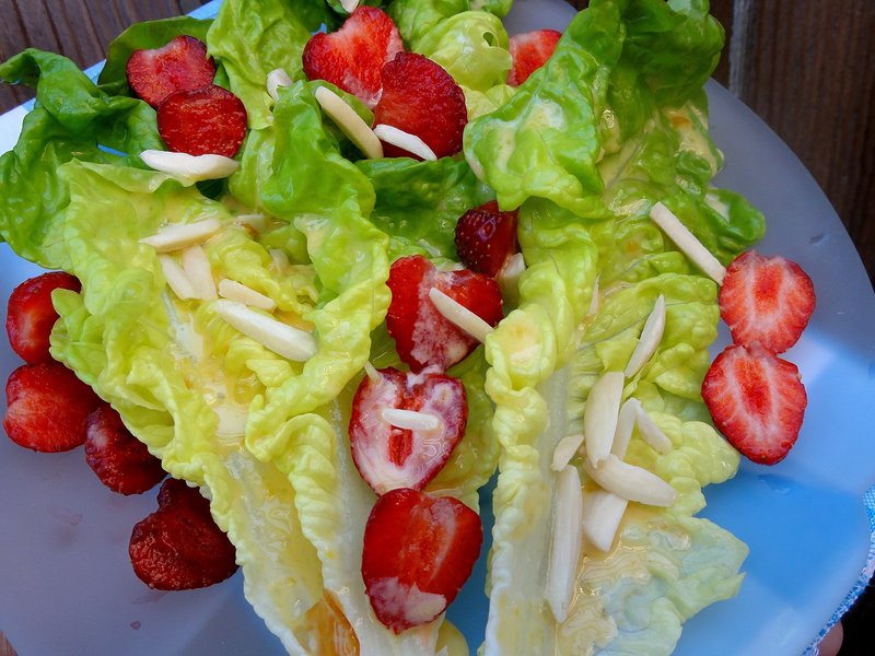 Mixed greens and strawberries with a citrus-spiced dressing