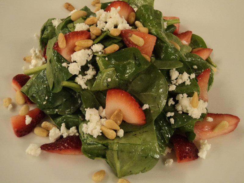 At Sea Glass in Cape Elizabeth, chef Mitchell Kaldrovich will be serving a strawberry and spinach salad made with baby spinach, goat cheese, pine nuts, fresh strawberries and a honey-sherry vinaigrette.