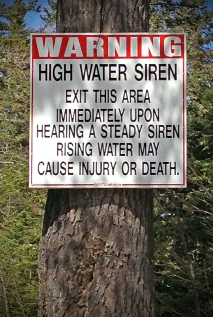 A sign warns about water-level changes at Flagstaff Lake in Eusis that could result from decisions by owners of the Flagstaff dam.