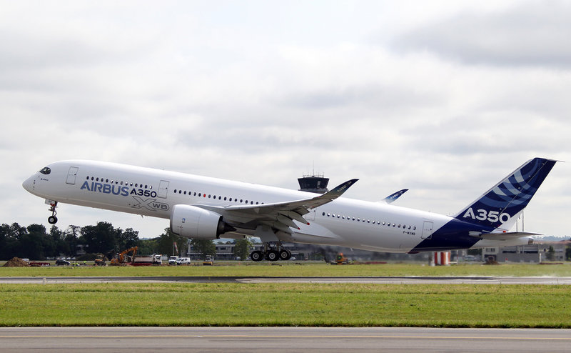 The Airbus A350 takes off near Toulouse, France, on Friday. The Airbus A350 sets up major competition for Boeing after the U.S. aerospace company ran into problems with the lithium batteries of its 787 Dreamliner.