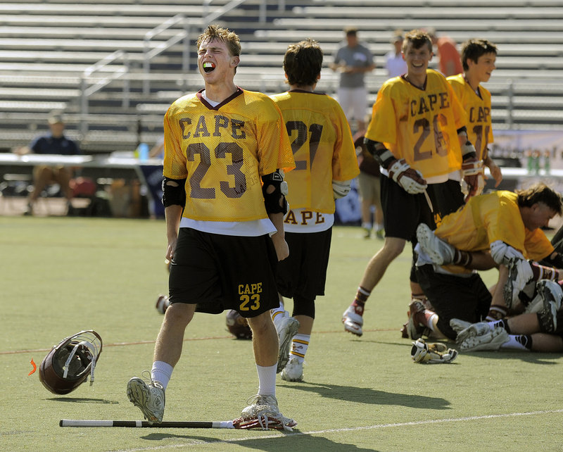 Cam Wilson lets out a scream during Cape Elizabeth’s victory celebration following a 7-4 win over Yarmouth in the Class B lacrosse state championship game.