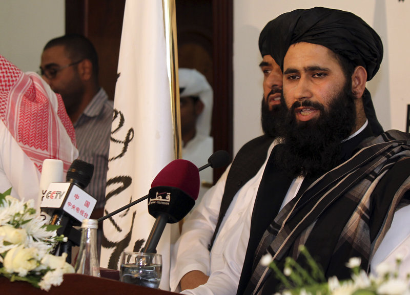 Muhammad Naim, a Taliban spokesman, speaks Tuesday at the Islamic militant movement’s new office in Doha, Qatar. U.S. and Taliban representatives are expected to meet soon.