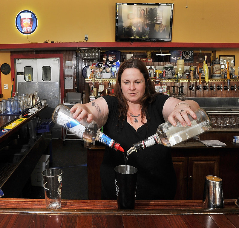 Kelly Greenlaw makes a Kinky Kilt at the GFB Scottish Pub in Old Orchard Beach by blending vodka, tequila, rum, gin, Triple Sec, melon liquor and Sprite.