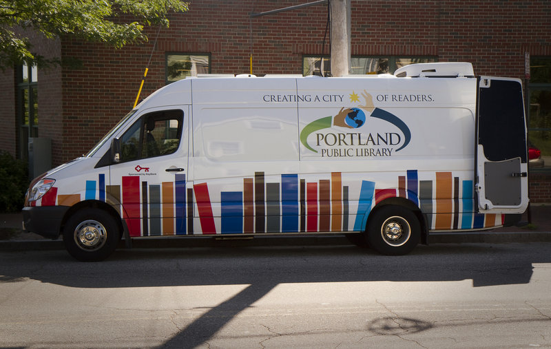 Portland Public Library's mobile unit parks in front of The Root Cellar on Washington Avenue in Portland on Friday, June 21, 2013. The mobile unit will make regular visits around Portland throughout the summer, supplying books to kids over the summer vacation.