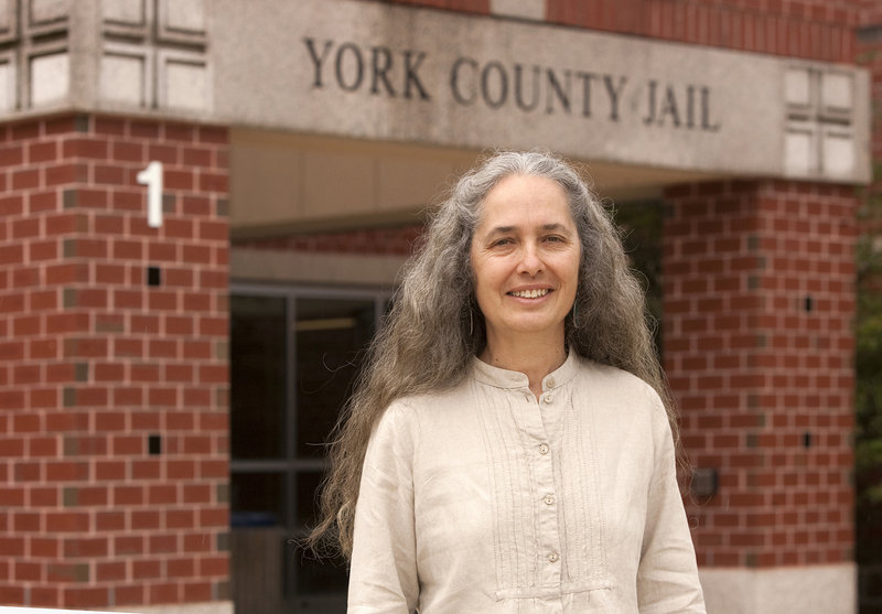 Jan Collins stands outside the York County Jail in Alfred before a visitation Sunday. Collins and her husband, who drive two hours twice a week from their home in Wilton to visit their inmate son, oppose the York County sheriff’s plan to end contact visits at the jail.