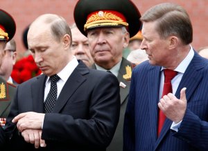 Russia's President Vladimir Putin and Chief of Staff of the Presidential Administration Sergei Ivanov attend a ceremony to commemorate the anniversary of the beginning of the Great Patriotic War against Nazi Germany in 1941 in Moscow