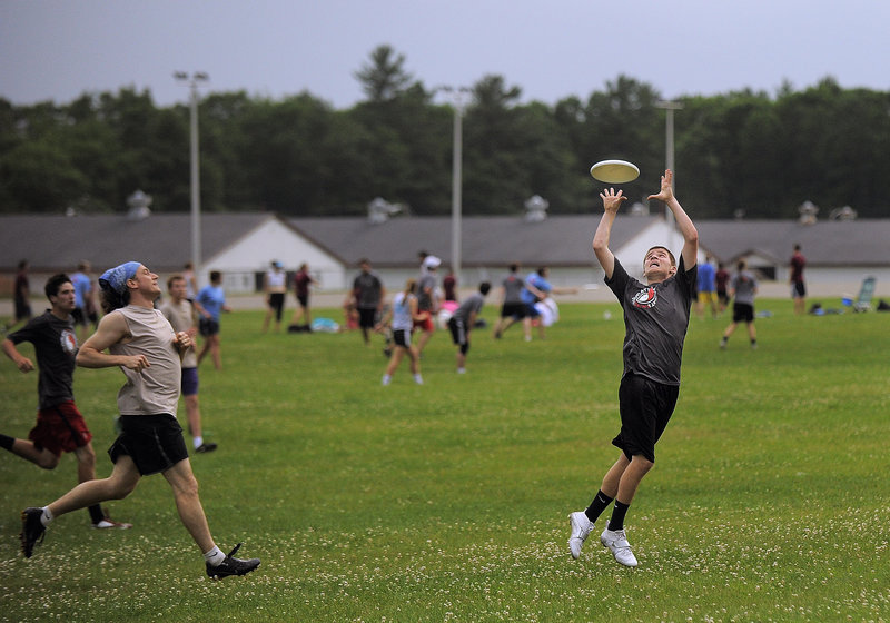Jared DeWolfe of Falmouth catches a goal for Rising Tide, a youth ultimate team made up of the best high school players in Maine.