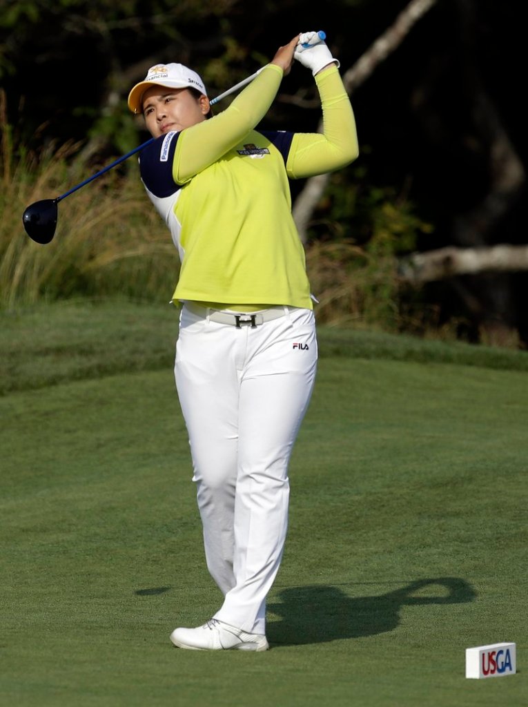 Inbee Park of South Korea tees off Thursday on the 13th hole of the first round of the U.S. Women’s Open. Park, seeking her third major title of the year, shot a 67 and is one behind.