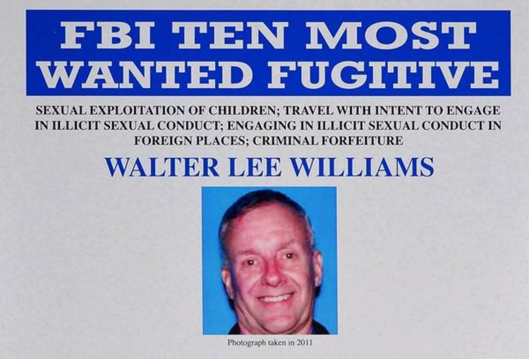 Photo shows a detail of a Federal Bureau of Investigation wanted poster for alleged child sex predator Walter Lee Williams.