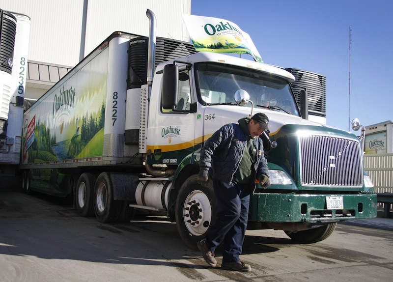 In this 2011 file photo, an Oakhurst truck driver prepares to head out for deliveries. New U.S. safety regulations requiring truckers to work shorter shifts may cut productivity, worsen a driver shortage and boost freight costs for the $8.4 trillion in goods hauled each year by American big rigs.