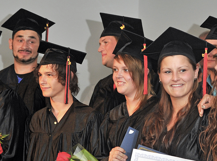 Twenty young men and women took part in a graduation ceremony from Youth Building Alternatives on June 28, 2013. The alternate education system helps dropouts get their GED certificates and more.