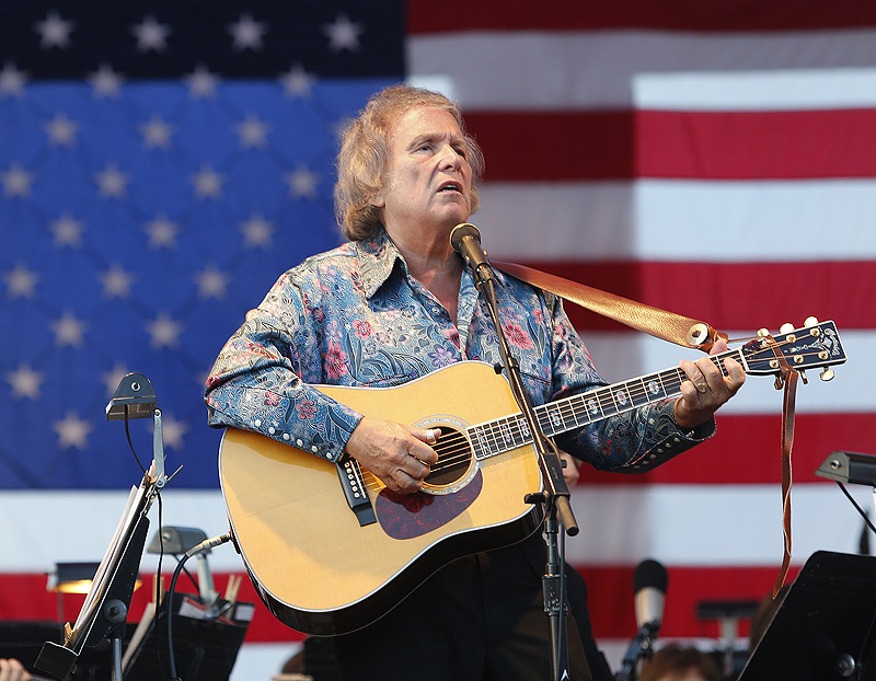“American Pie” songwriter and Thursday’s special guest artist Don McLean performs with the Portland Symphony Orchestra. McLean, a Camden resident, had the crowd singing along to the chorus of his hit song.