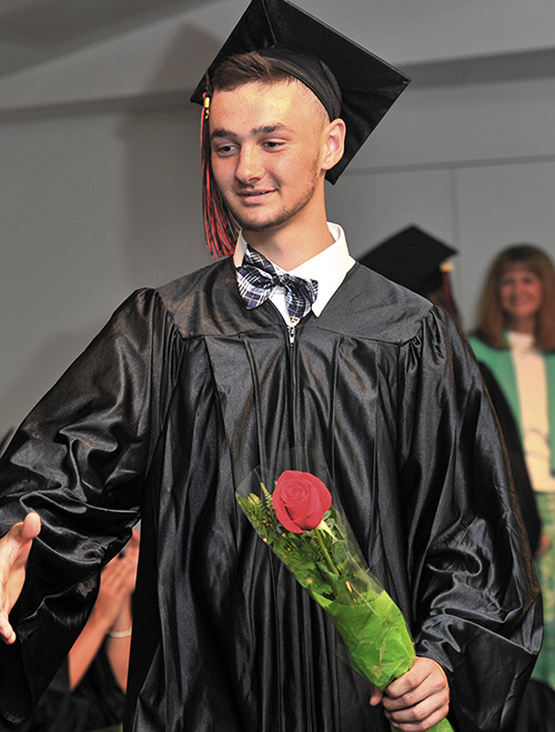 Andrew Annis was among those graduating from LearningWorks' Youth Building Alternatives on June 28, 2013.