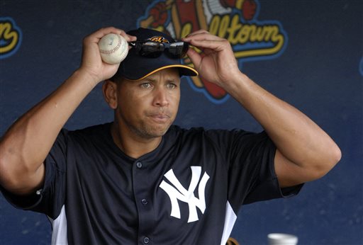 In this July 15, 2013, photo, New York Yankees third baseman Alex Rodriguez heads out to batting practice before a Class AA baseball game with the Trenton Thunder. Rodriguez is one of about 20 major league players who are being investigated for their involvement with Biogenesis, a now-shuttered anti-aging clinic in South Florida.