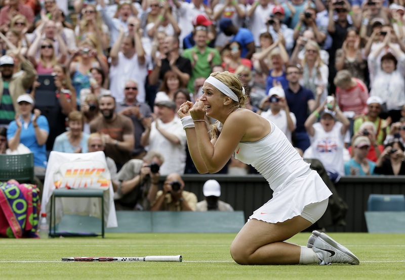 Sabine Lisicki of Germany after beating Serena Williams of the United States in a Women's singles match at the All England Lawn Tennis Championships in Wimbledon, London, Monday, July 1, 2013. (AP Photo/Alastair Grant)