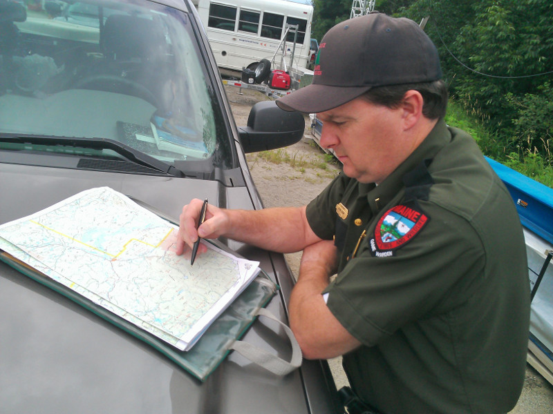 Lt. Kevin Adam of the Maine Warden Service goes over the route of the agency's search today for Geraldine Largay, 66, of Tennessee, who went missing on the Appalachian Trail between Rangeley and Wyman Township last week.