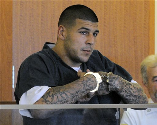 Former New England Patriots football tight end Aaron Hernandez appears at a bail hearing in Fall River Superior Court in this June 27, 2013, photo taken in Fall River, Mass.