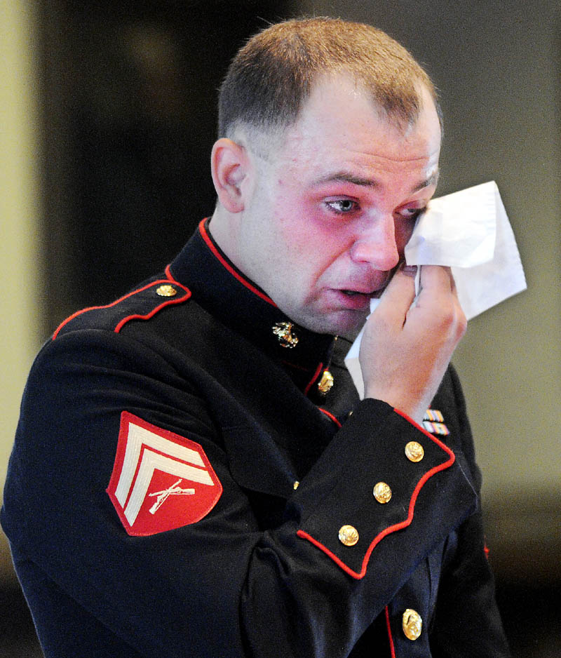 Clad in the dress uniform of the Marine Corps, Travis Lawler was sentenced to four years Monday, July 29, 2013 at Kennebec County Superior Court for driving drunk that that killed his sister and her boyfriend and seriously injured a passenger.