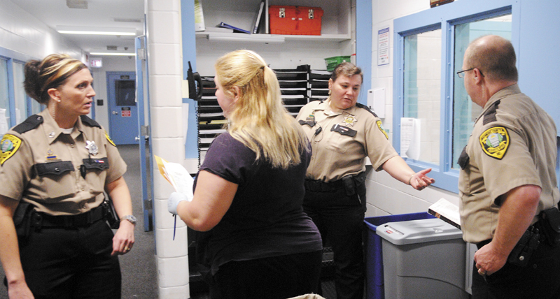 Kennebec County Corrections Facility officers and staff check a cell block Thursday May 30, 2013 at the jail in Augusta.