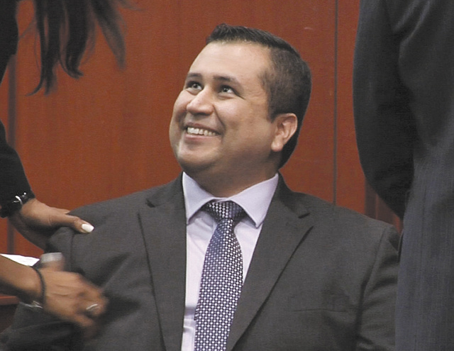 In this image from video, George Zimmerman smiles after a not guilty verdict was handed down in his trial at the Seminole County Courthouse on Saturday in Sanford, Fla. Zimmerman was cleared of all charges Saturday in the shooting of Trayvon Martin, the unarmed black teenager whose killing unleashed furious debate across the U.S. over racial profiling, self-defense and equal justice.