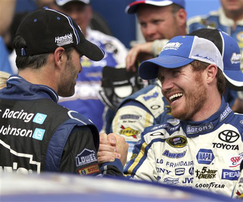Brian Vickers, right, is congratulated by Jimmie Johnson in Victory Lane after winning the NASCAR Sprint Cup Series auto race Sunday at New Hampshire Motor Speedway in Loudon, N.H.